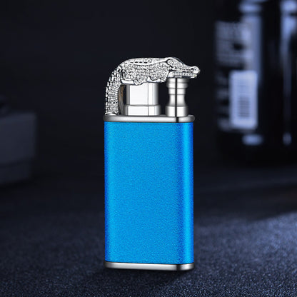 Blue metal windproof double flame lighter with detailed silver crocodile design on top
