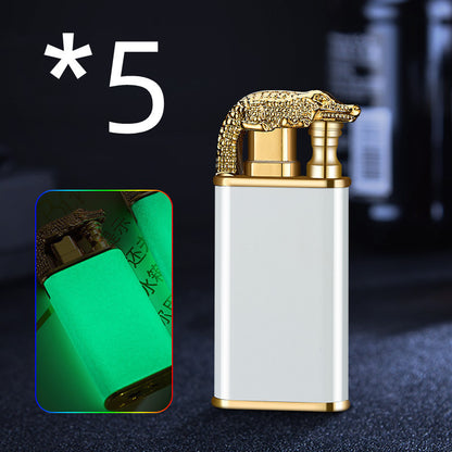 White metal windproof cigar lighter with gold crocodile design and glow-in-the-dark feature