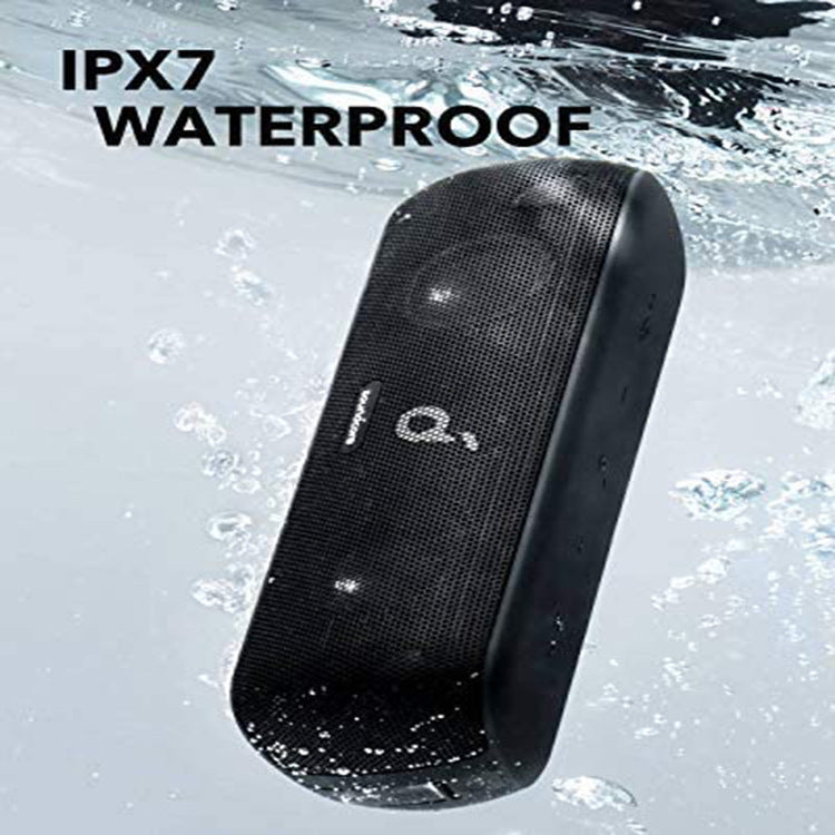 Black portable Bluetooth speaker submerged in water, showcasing IPX7 waterproof rating