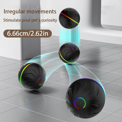 Black interactive dog toy ball with rainbow accents bouncing irregularly on gray tile floor