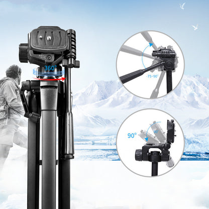 Black aluminum camera tripod with 360° rotating head and adjustable tilt angles shown in snowy mountain background