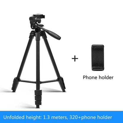 Black aluminum SLR camera tripod with adjustable height and included phone holder