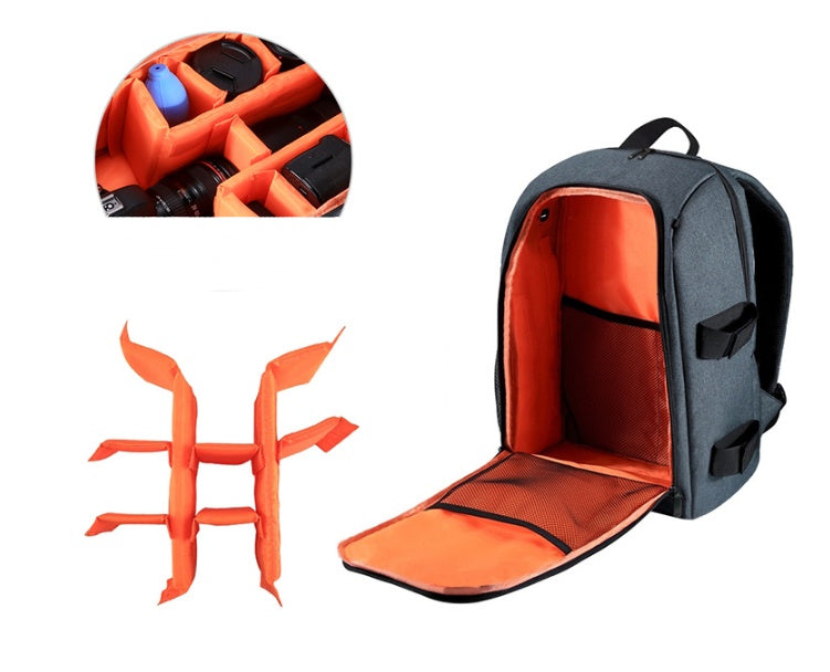 black waterproof camera backpack with orange padded compartments and removable inserts