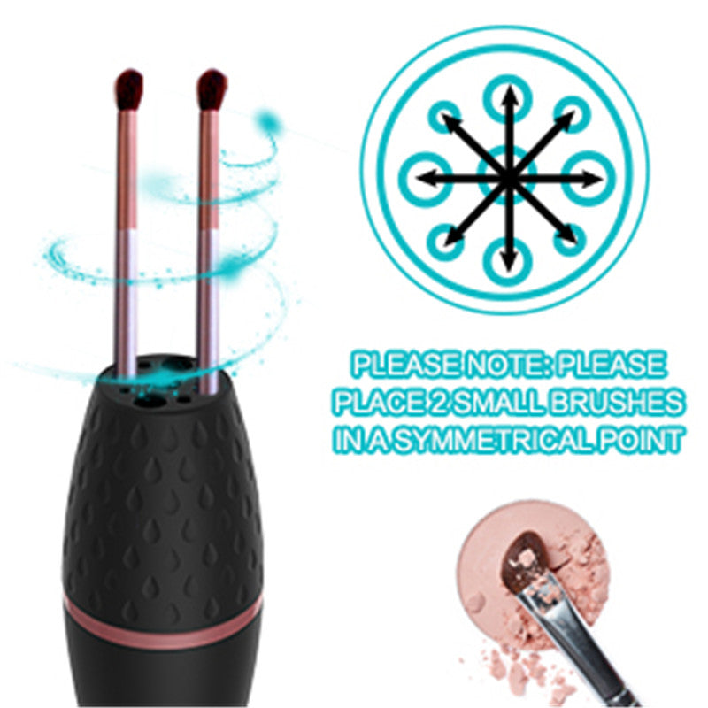Black electric makeup brush cleaner holding two cosmetic brushes with symmetrical placement guide