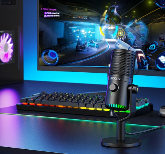 Maono black esports gaming microphone with noise cancelling on desk with colorful RGB keyboard and futuristic game on monitor