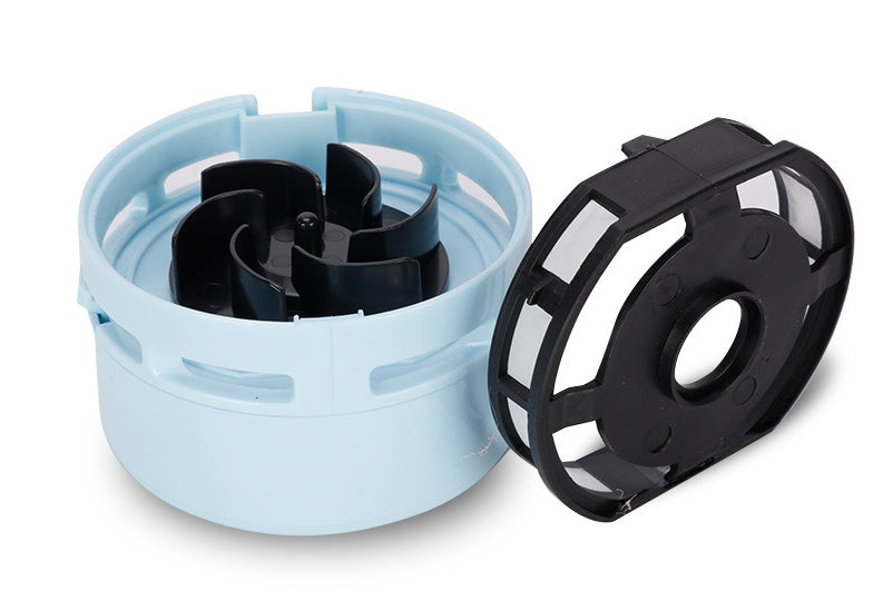 Black and light blue plastic vacuum cleaner filter components on white background