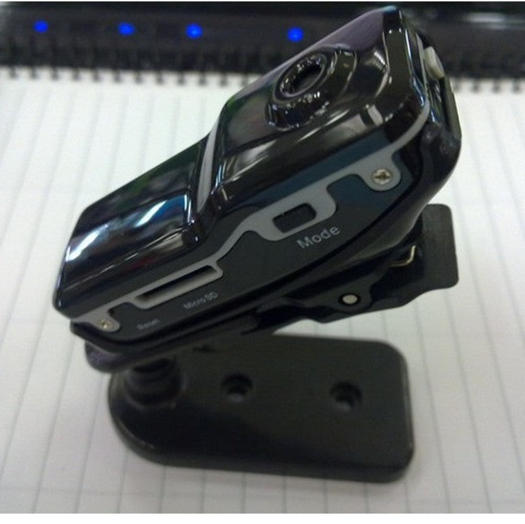 Black Trendoligy mini HD DV camera with clip mount, showing mode button and microSD slot