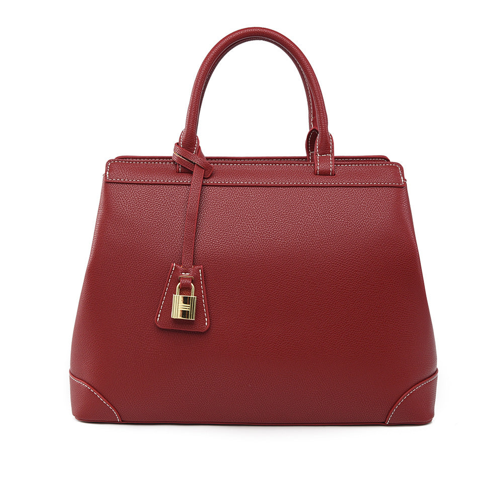 Elegant red PU leather vertical square handbag with gold lock and white stitching