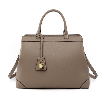 Taupe textured PU leather handbag with top handles and gold-tone lock detail