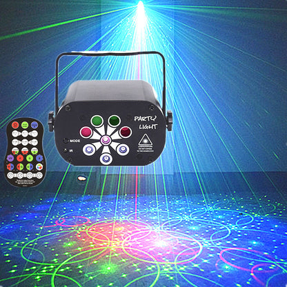 Black LED party light with remote control projecting colorful laser patterns on dark stage floor