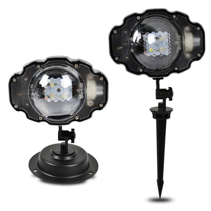 Black LED snowfall projector light with clear dome and adjustable stake for outdoor Christmas decoration