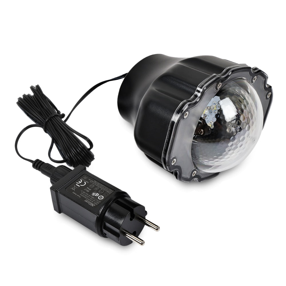 Black LED snowfall projector light with European plug and long cable on white background