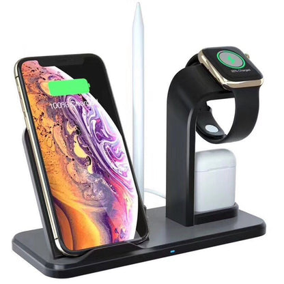 Black wireless charging station with smartphone, smartwatch, wireless earbuds, and stylus pen on white background