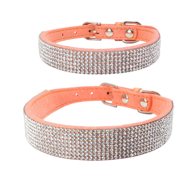 Peach velvet dog collar adorned with multiple rows of clear rhinestones and a silver buckle