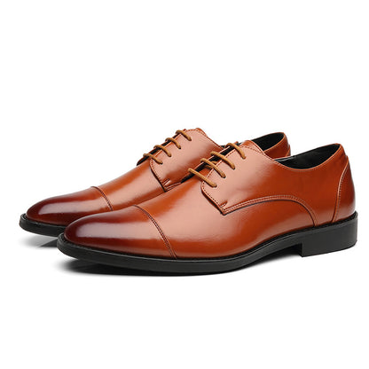 Men's brown leather dress shoes with pointed toe and lace-up design on white background