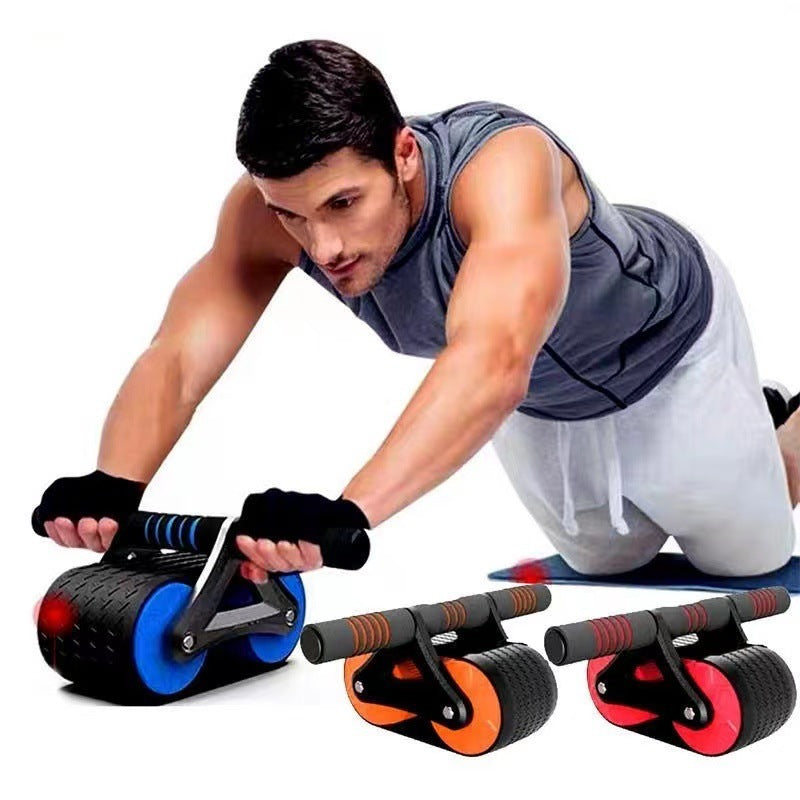 Man using blue ab roller wheel for core workout with additional orange and red ab rollers on white background