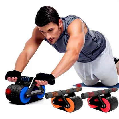 Man using blue ab roller wheel for core workout with additional orange and red ab rollers on white background