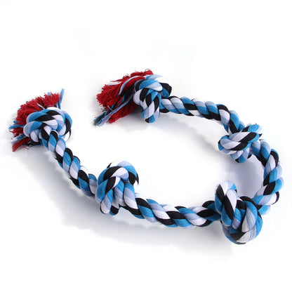 Blue, white, black dog rope chew toy with red frayed ends and multiple knots on white background