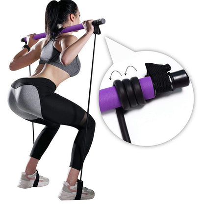 Woman performing squats using purple Pilates resistance bar with adjustable resistance bands