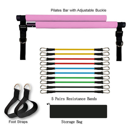 Pink Pilates bar with adjustable buckles, five pairs of colorful resistance bands, black foot straps, and a storage bag