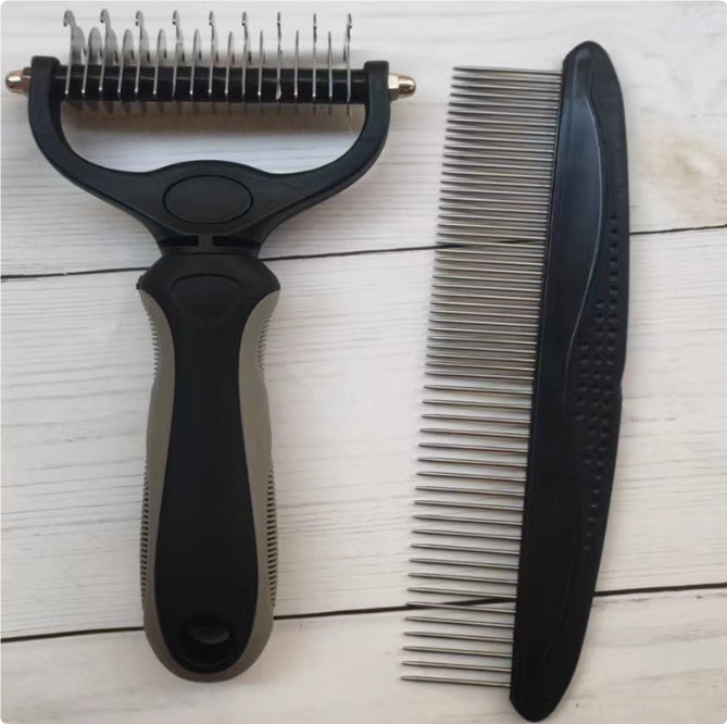 Double sided stainless steel pet comb and black metal pet grooming deshedding tool on light wood