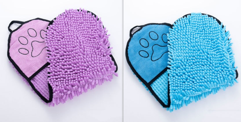Pair of microfiber pet drying gloves in purple and blue with paw print design and textured absorbent surface