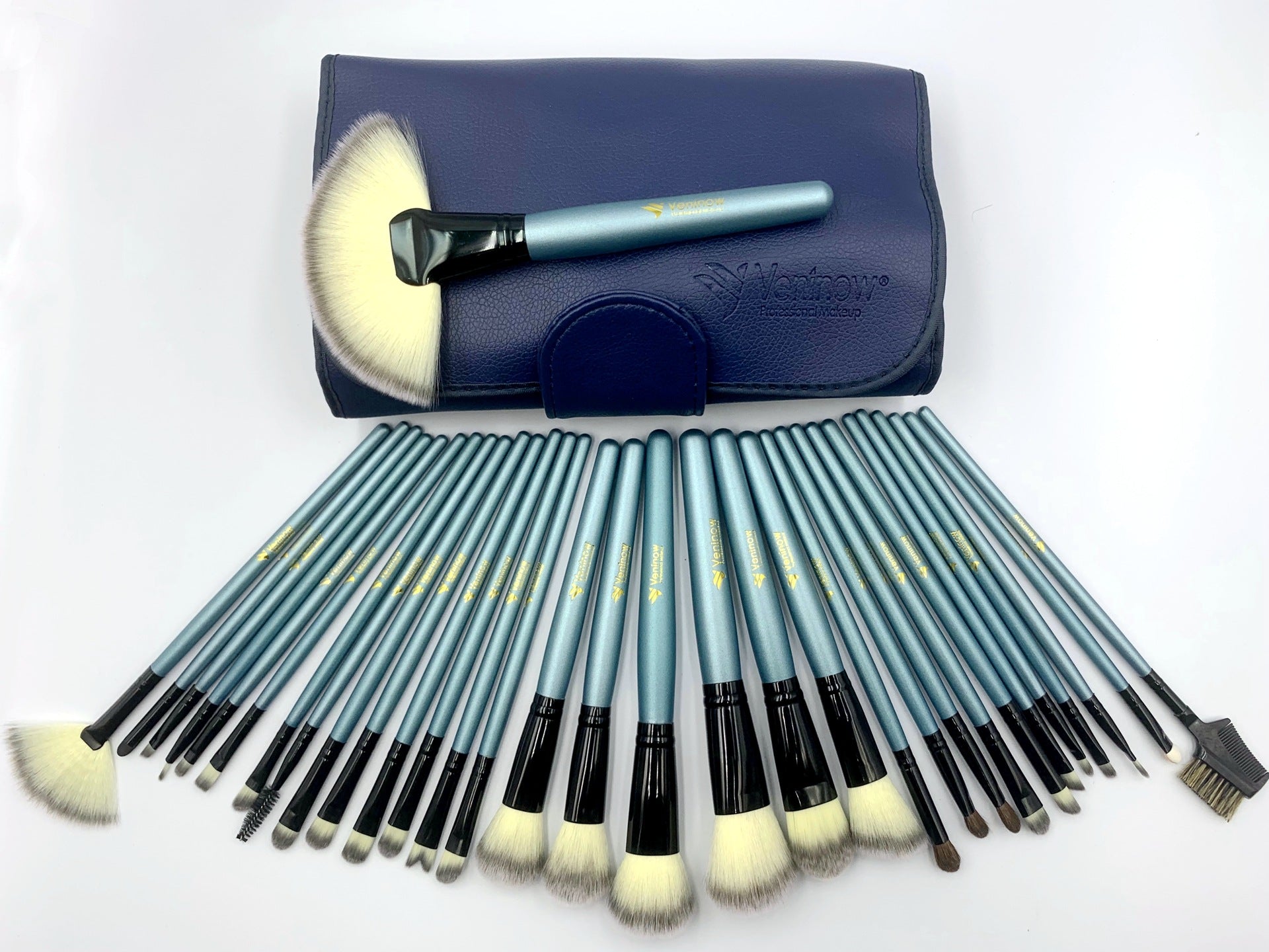 32-piece blue makeup brush set with man-made fiber bristles and dark blue carrying case