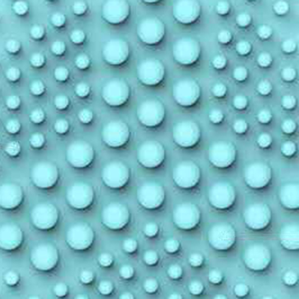 Close-up of blue 3D silicone facial cleansing brush with raised rounded bristles