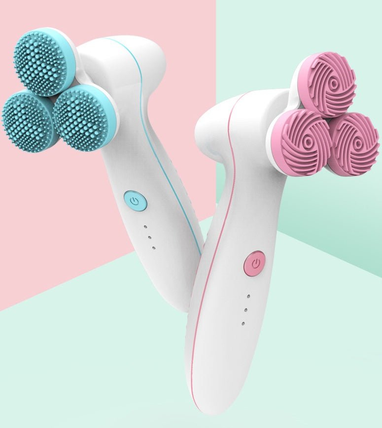 Two white electric facial cleansing brushes with silicone brush heads in blue and pink, on pastel split background
