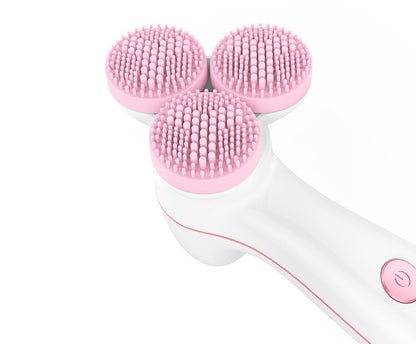 White and pink 3-head silicone facial cleansing brush with soft bristles and power button