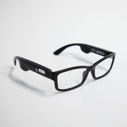 black smart glasses with clear lenses and integrated Bluetooth controls on white background