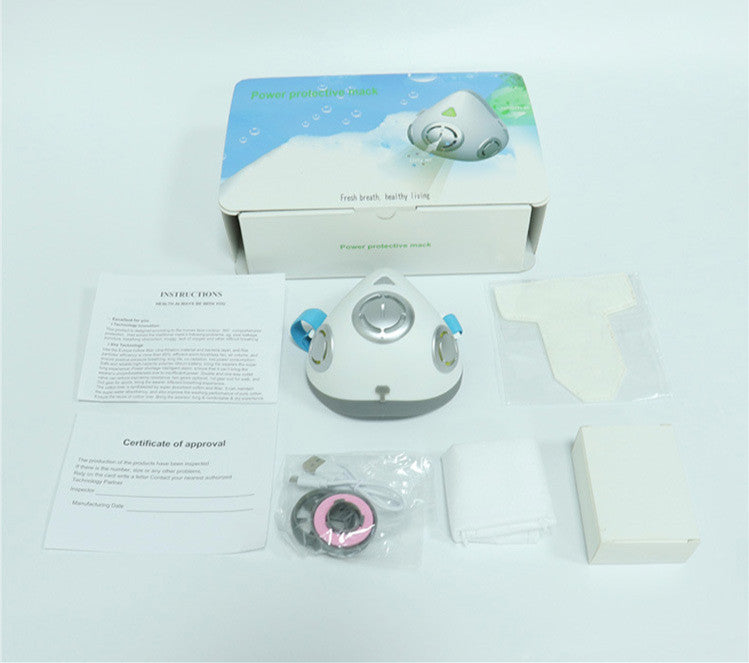 Electric breathable anti-dust face mask kit with valve, USB charger, filters, and instructions on white background