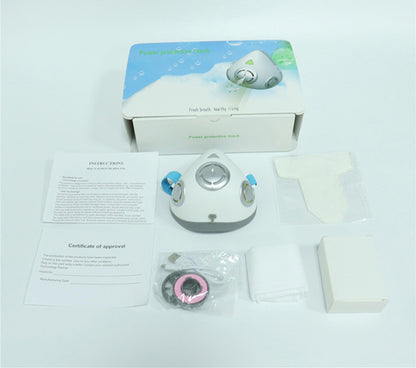 Electric breathable anti-dust face mask kit with valve, USB charger, filters, and instructions on white background