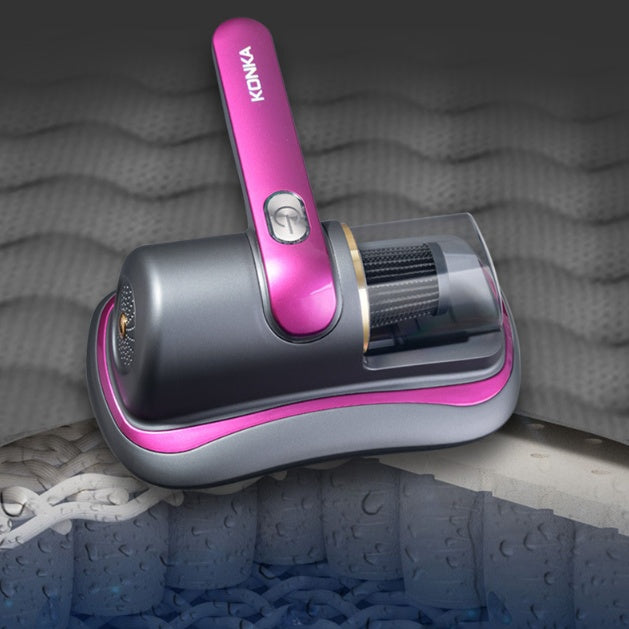 Konika wireless mite vacuum cleaner with pink and gray design on textured surface