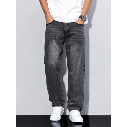 Men's black washed straight leg jeans with loose fit, paired with white sneakers and white t-shirt