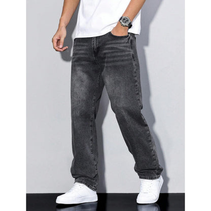 Men's black washed straight leg jeans with loose fit paired with white sneakers and a white t-shirt