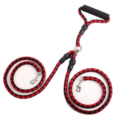Double dog leash in red and black braided rope with padded handle and metal clips