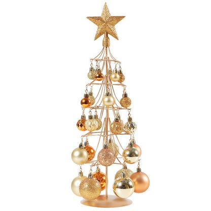 Modern bronze gold metal Christmas tree with assorted metallic and glitter ornaments topped with a glittery star