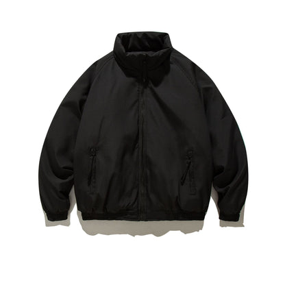 Black cotton padded unisex jacket with zipper pockets and elastic cuffs on white background