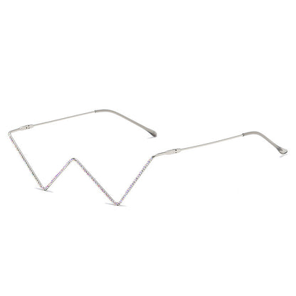 Metal half-frame glasses with zigzag design and rhinestone accents on white background
