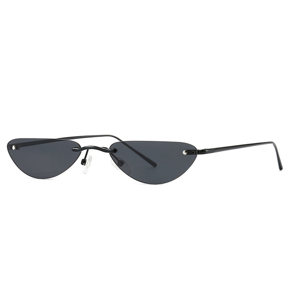 Black cat eye sunglasses with narrow lenses and thin metal frame on white background