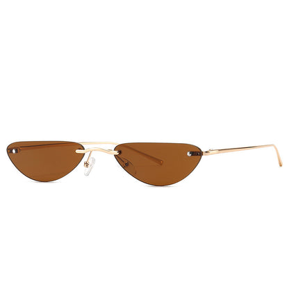 Retro narrow cat eye sunglasses with brown lenses and thin gold plastic alloy frame