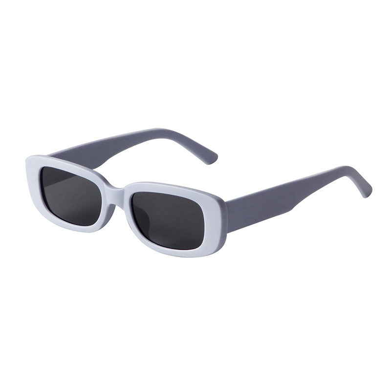 Rectangular black lens sunglasses with white frame and gray arms, lightweight fashion eyewear