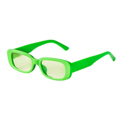 Bright green rectangular sunglasses with translucent yellow lenses, lightweight fashion eyewear