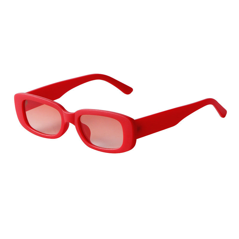 Red rectangular fashion sunglasses with lightweight frames and UV protection lenses