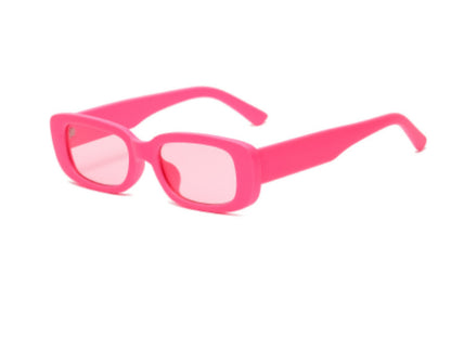Pink rectangular fashion sunglasses with tinted lenses and thick frames on white background