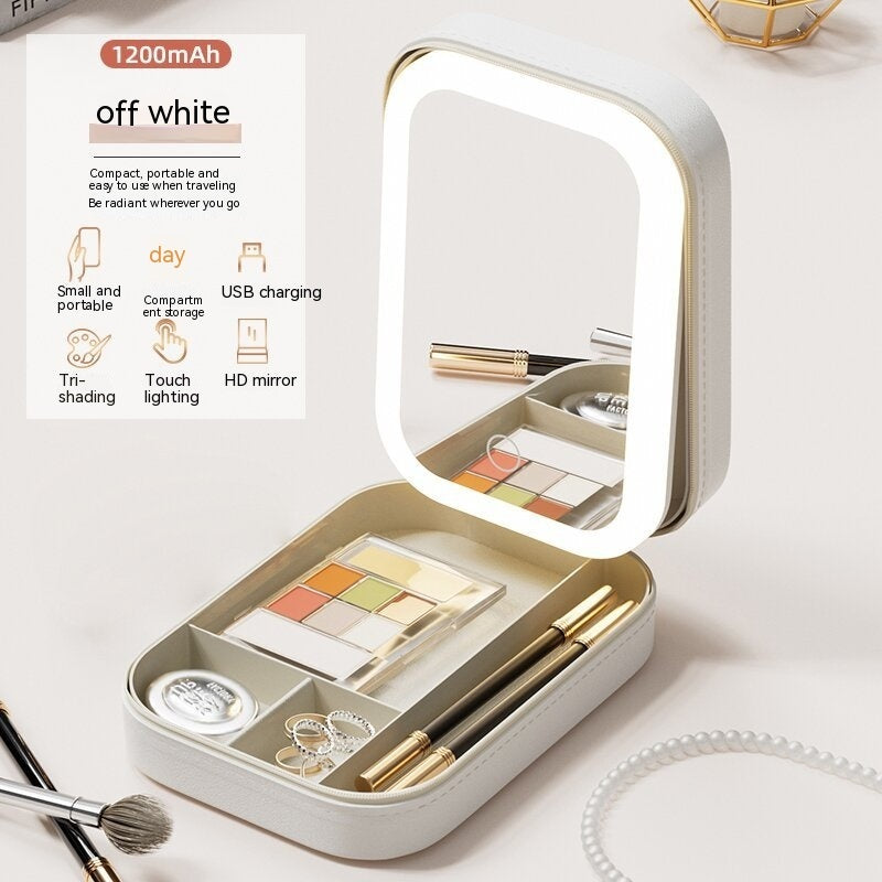 Off white portable LED makeup storage box with adjustable mirror, USB charging, and compartment organizer