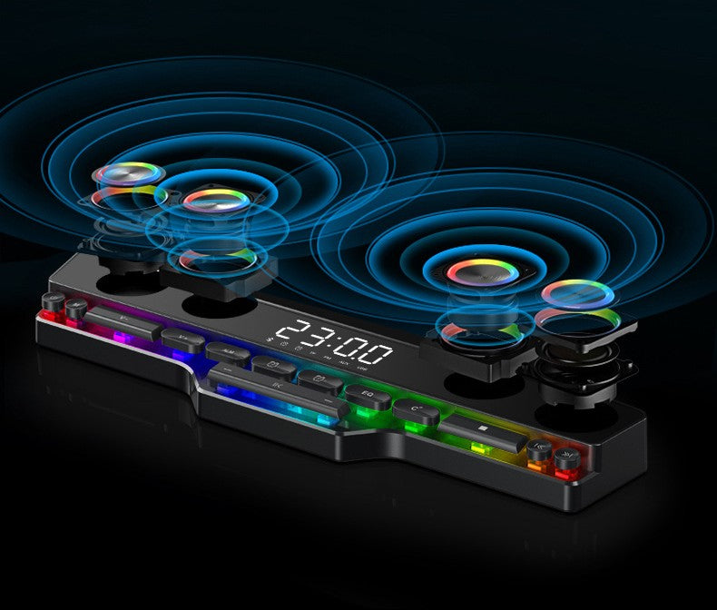 Black desktop Bluetooth speaker with RGB LED lights and digital clock display showing 23:00
