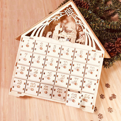 Wooden DIY Christmas advent calendar with nativity scene and numbered drawers for holiday countdown