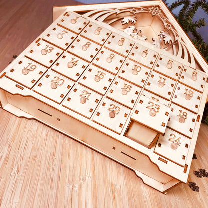 DIY wooden Christmas advent calendar with 24 numbered drawers and nativity scene cutout